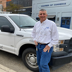 Cox supervisor dressed up in formal