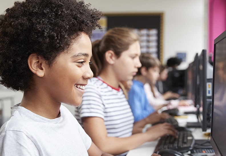Kids having classes on computers