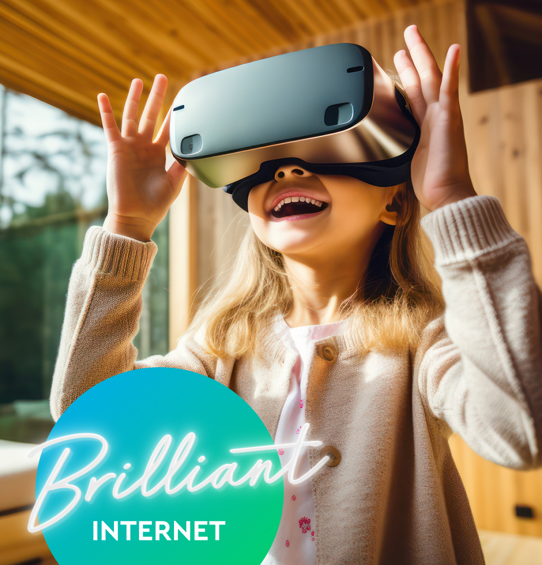 Small Girl Watching in VR Headset and Smiling with Brilliant Internet Logo