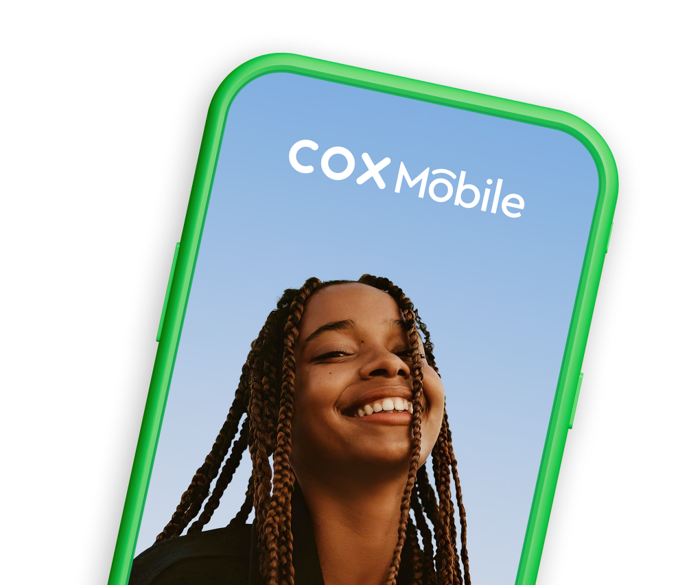 Mobile phone top half silhouette in green slanted right with girl smiling on screen