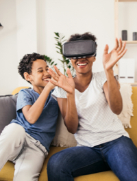 Mom and son playing with virtual reality headset